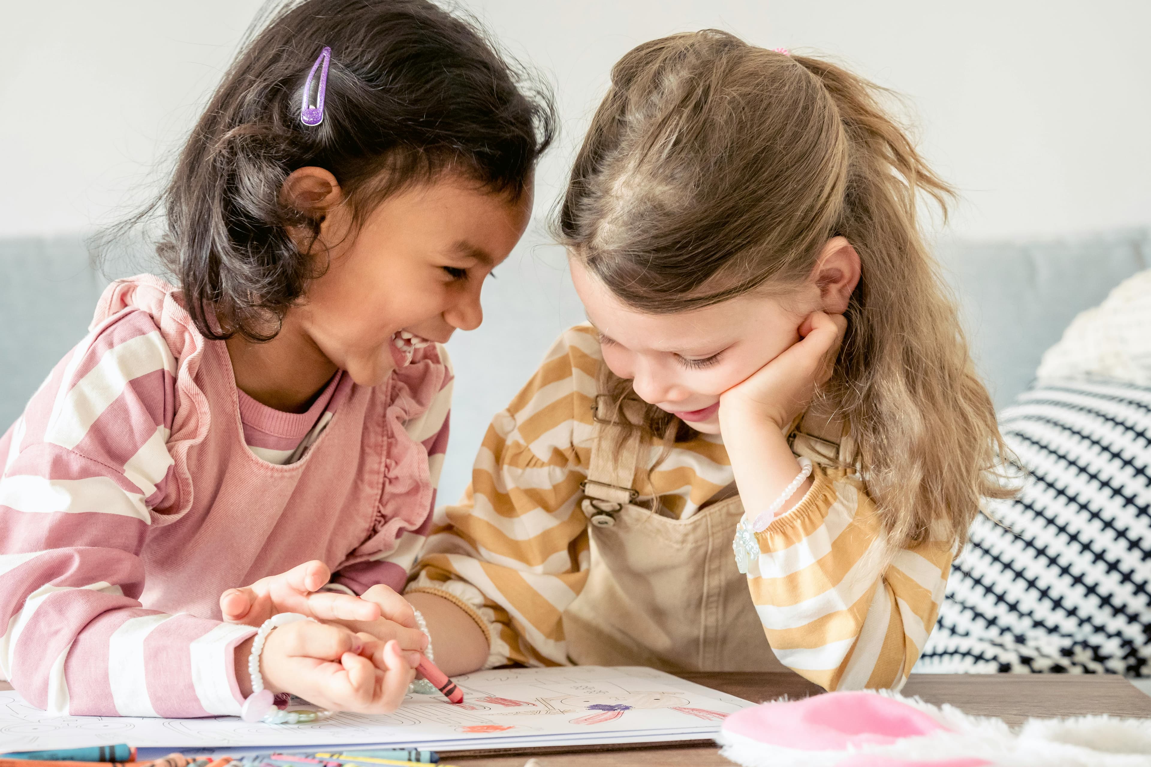 Child colouring their personalised book